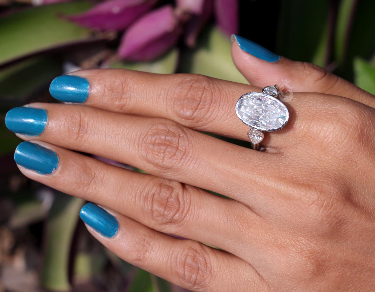 Elongated Oval Moissanite Bezel Engagement Ring, Three Stone, Side Pears