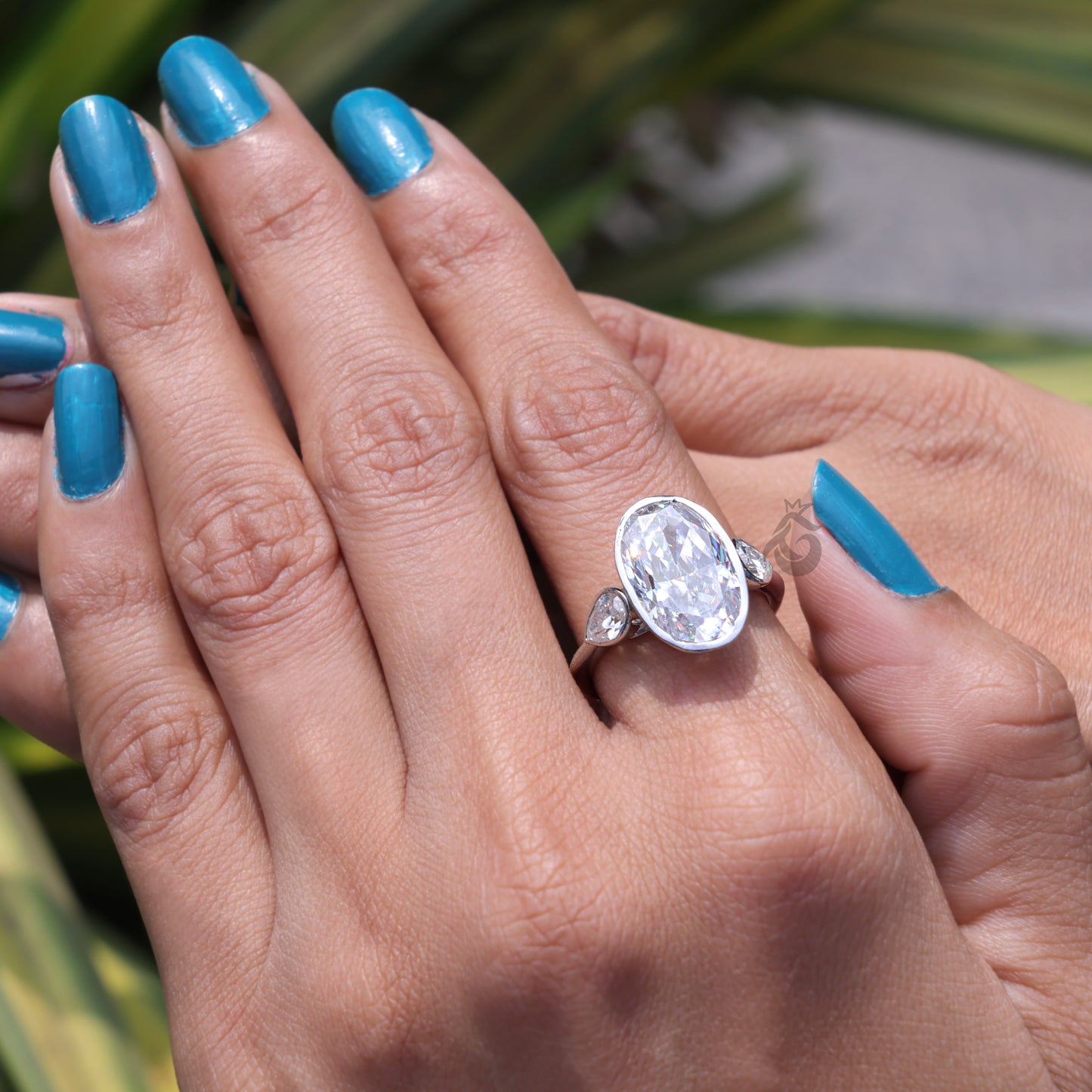 Elongated Oval Moissanite Bezel Engagement Ring, Three Stone, Side Pears