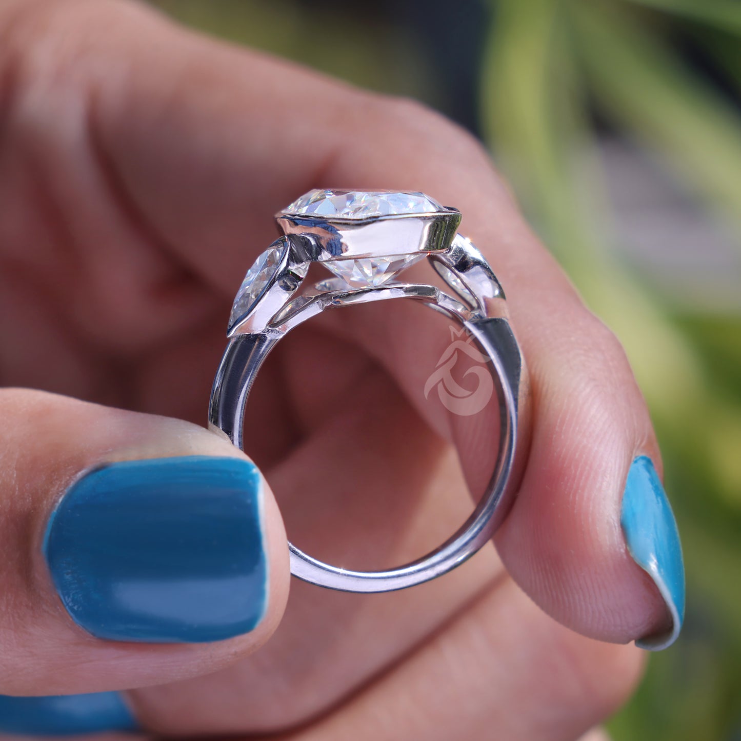 Elongated Oval Moissanite Bezel Engagement Ring, Three Stone, Side Pears