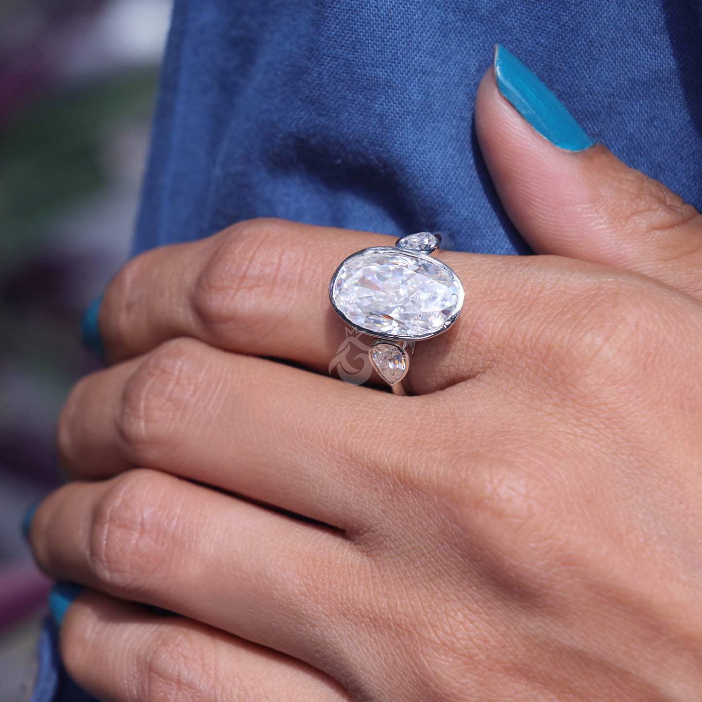 Elongated Oval Moissanite Bezel Engagement Ring, Three Stone, Side Pears