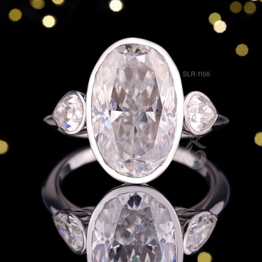 Elongated Oval Moissanite Bezel Engagement Ring, Three Stone, Side Pears