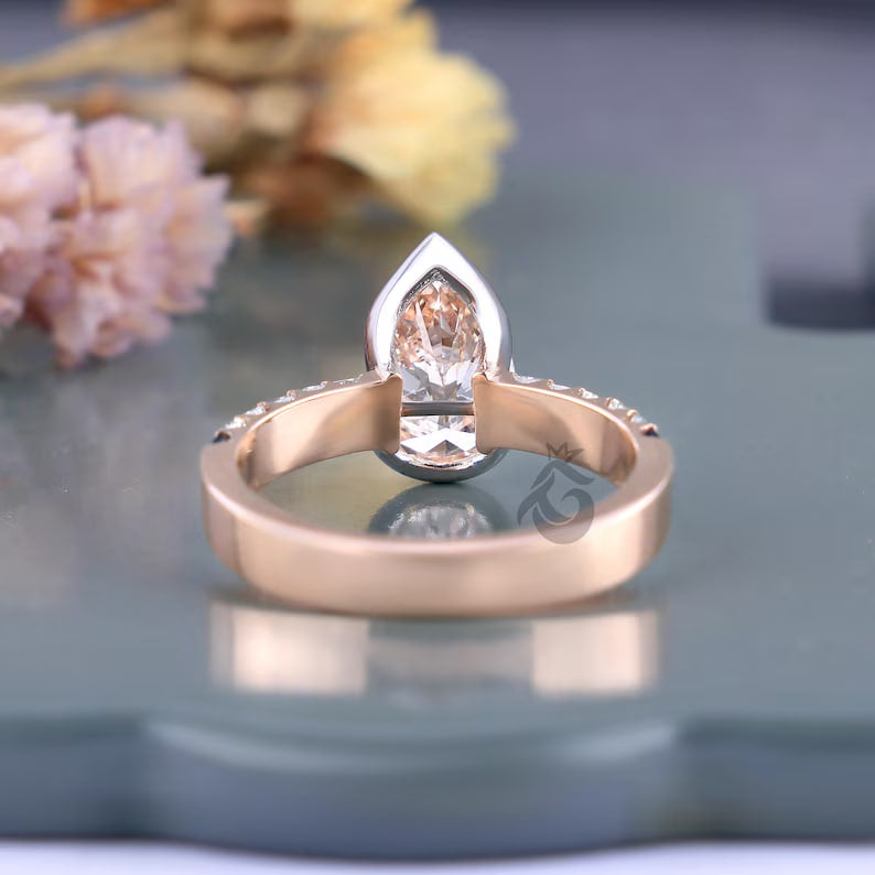 2.00 CT Pear Cut Pink Lab Diamond Ring, Half Bezel Set with Baguette Sides